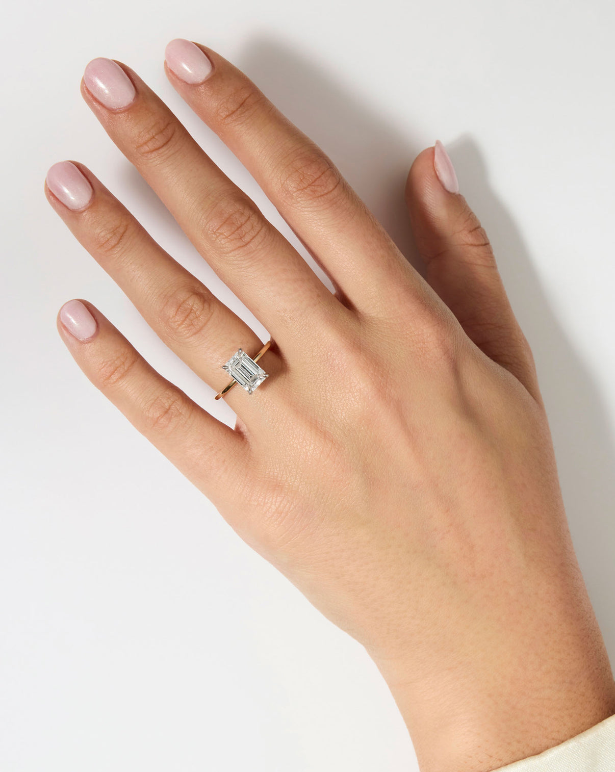 Ring Concierge Engagement Rings | 3 carat Emerald Diamond Ring in Yellow Gold Whisper Thin on hand