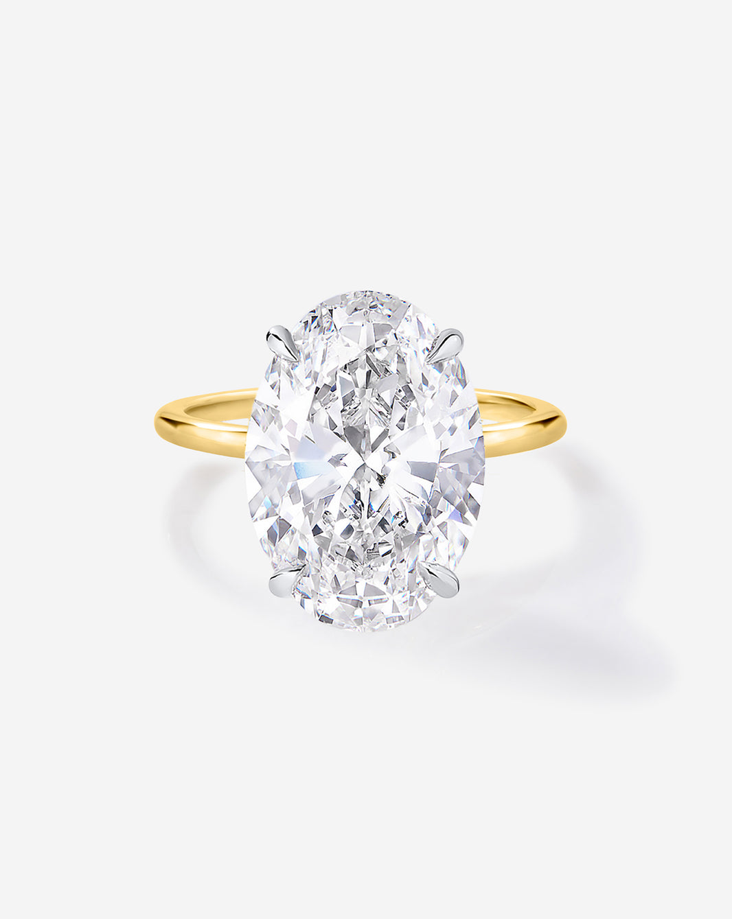 6 carat Oval Diamond Engagement Ring in Yellow Gold Whisper Thin Hidden Halo band with Platinum Prongs