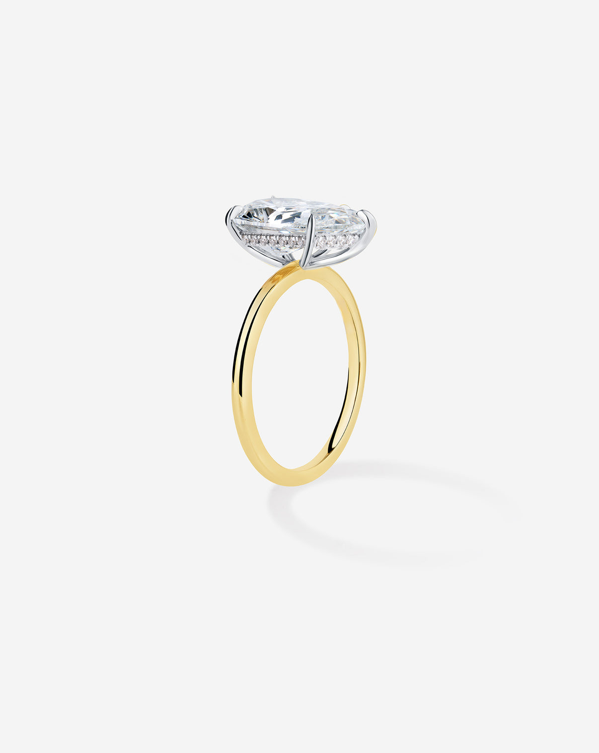 3 carat Pear Diamond Engagement Ring in Yellow Gold Whisper Thin Hidden Halo band with Platinum Prongs side view