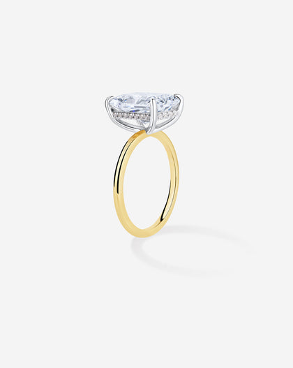 3 carat Radiant cut Diamond Engagement Ring in Yellow Gold Whisper Thin Hidden Halo band with Platinum Prongs side view
