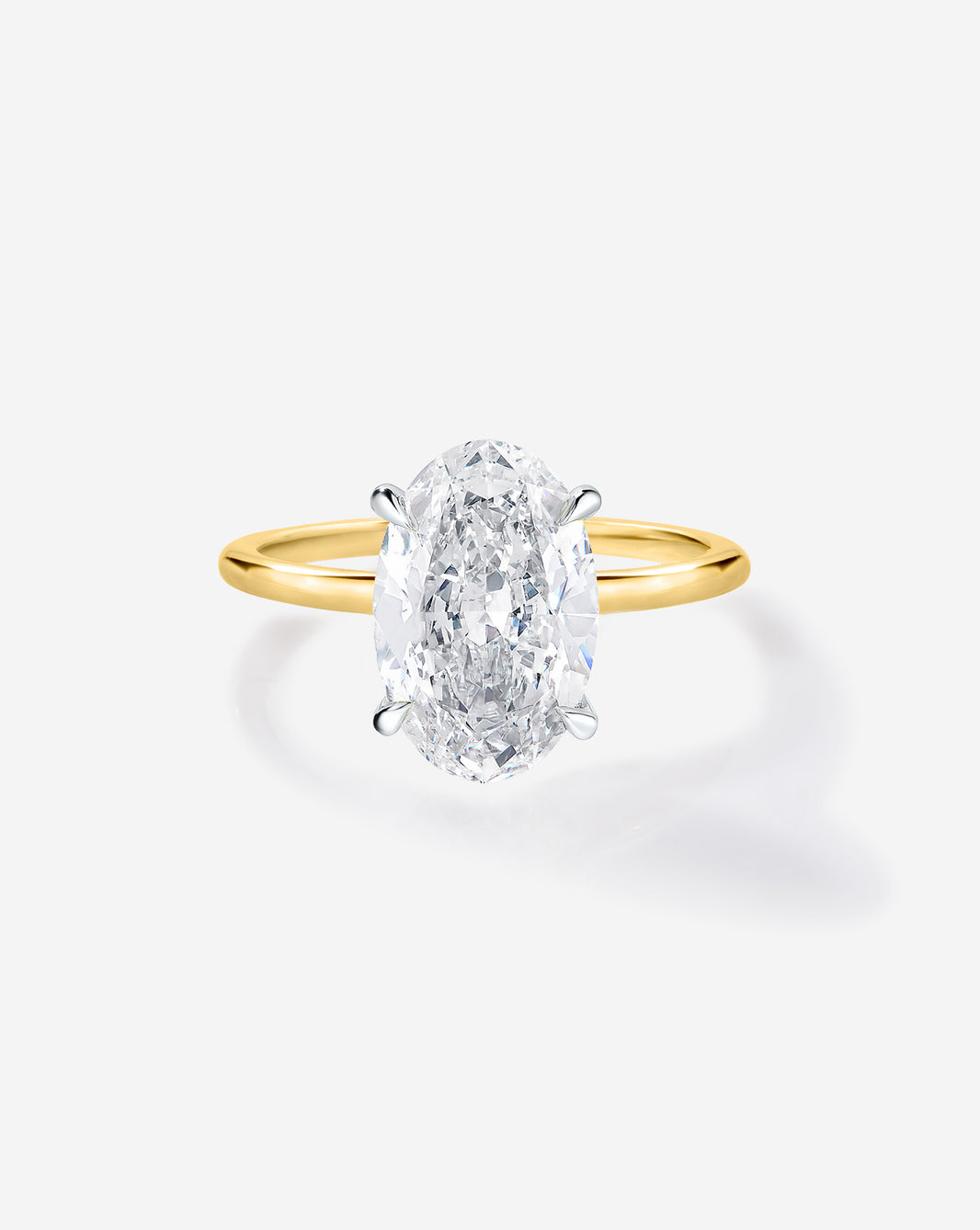 2 carat Oval Diamond Engagement Ring in Yellow Gold Whisper Thin band with Platinum Prongs