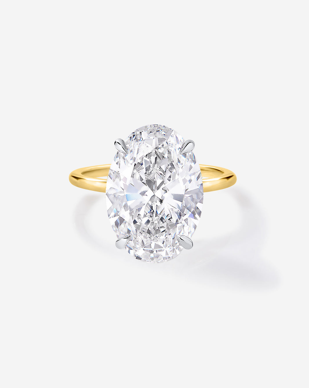 4 carat Oval Diamond Engagement Ring in Yellow Gold Whisper Thin band with Platinum Prongs