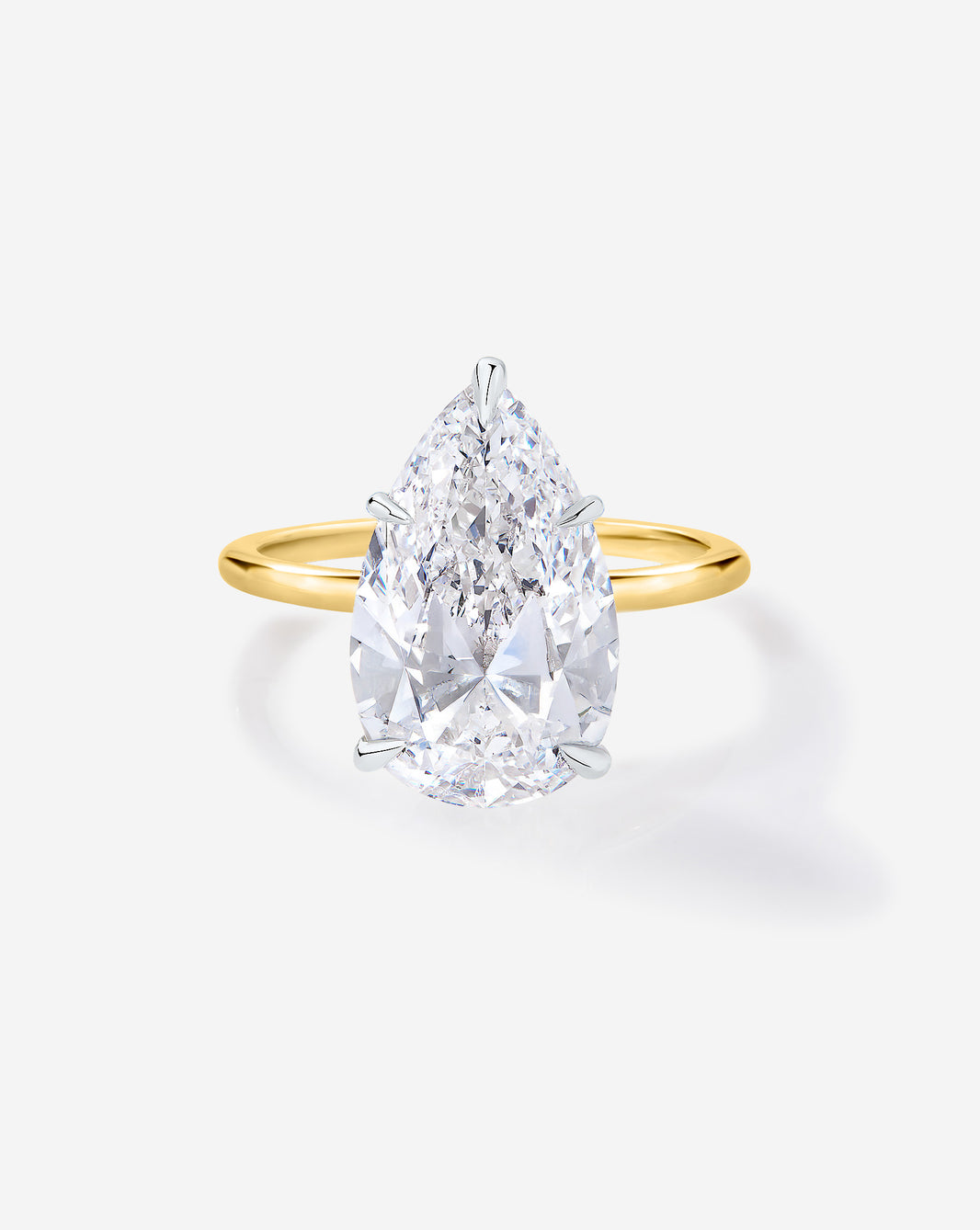 Front view of 3 carat Pear diamond engagement ring with Yellow Gold Whisper Thin band and Platinum Prongs