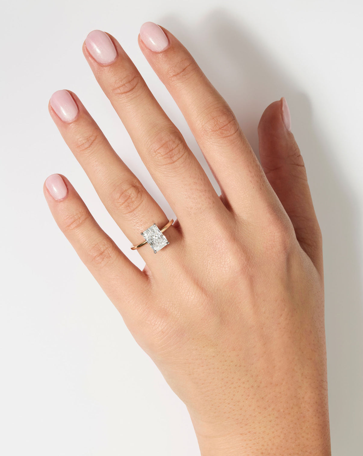 Ring Concierge Engagement Rings | 2 carat Radiant Cut Diamond Ring in Yellow Gold Whisper Thin shown on model's hand