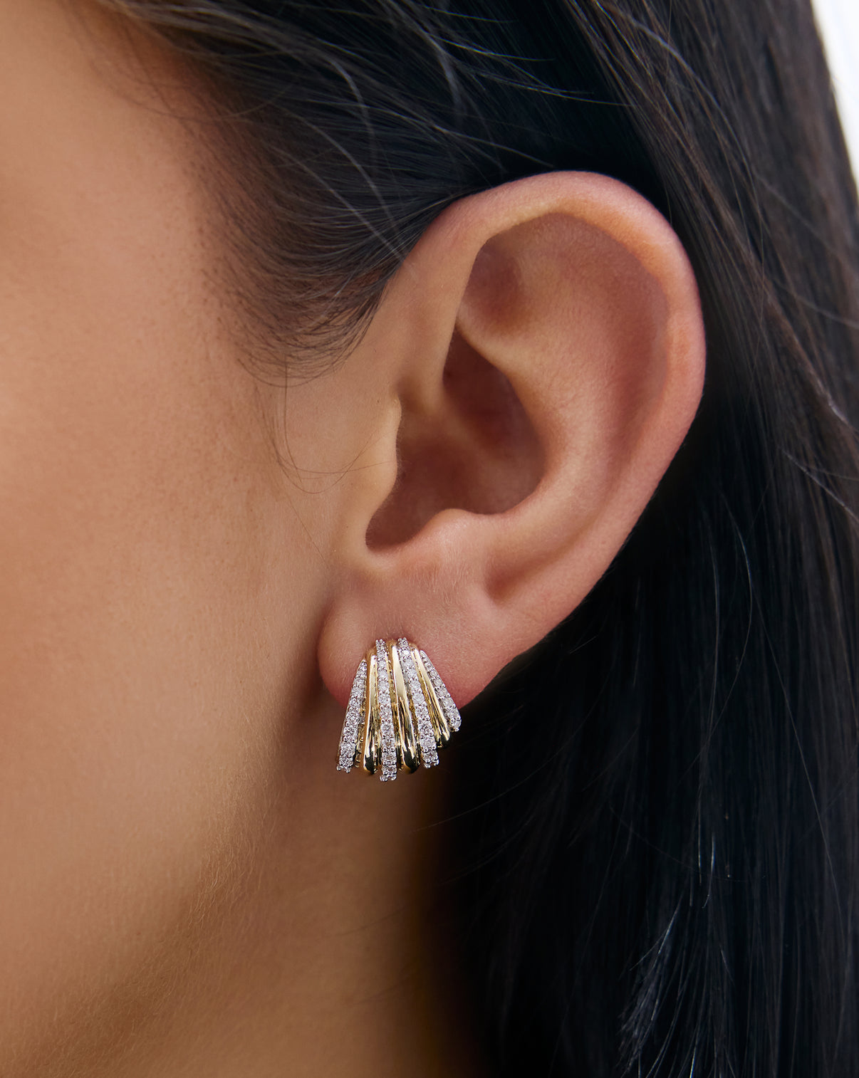Ribbed Diamond Huggies shown on model's ear