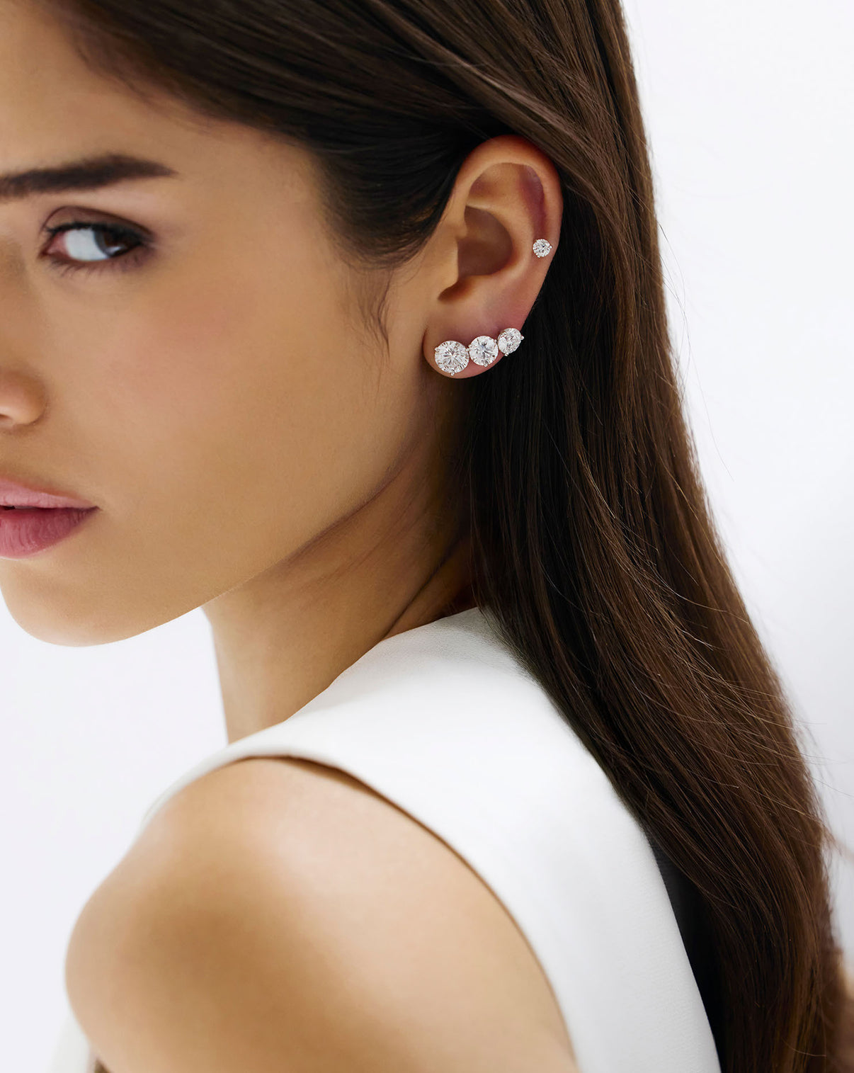 round stud earrings on model in different sizes GLOBAL