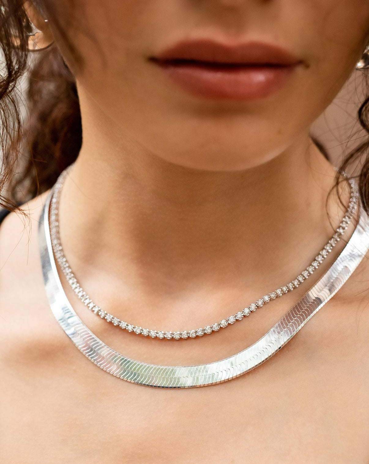 Statement Sterling - Jumbo Herringbone Necklace Sterling Silver, on model layered with diamond tennis necklace