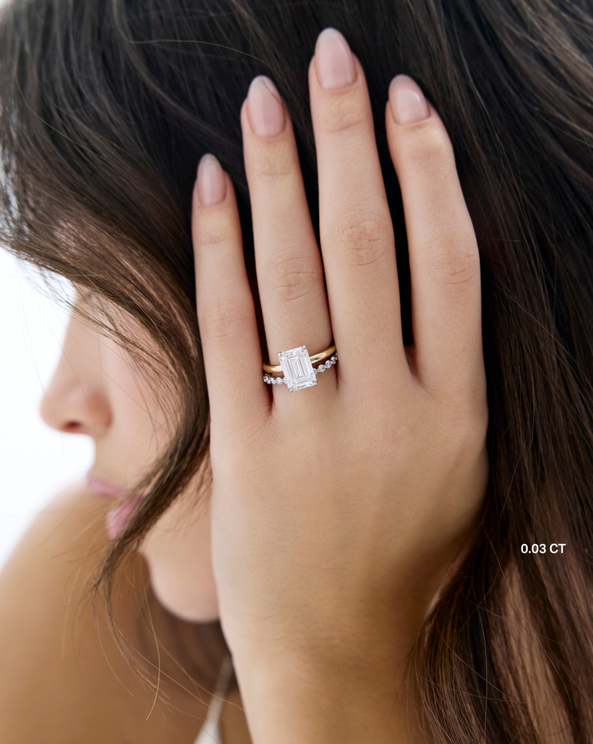 Single Prong Lab Diamond Band in .03 carat weight paired with engagement ring - global