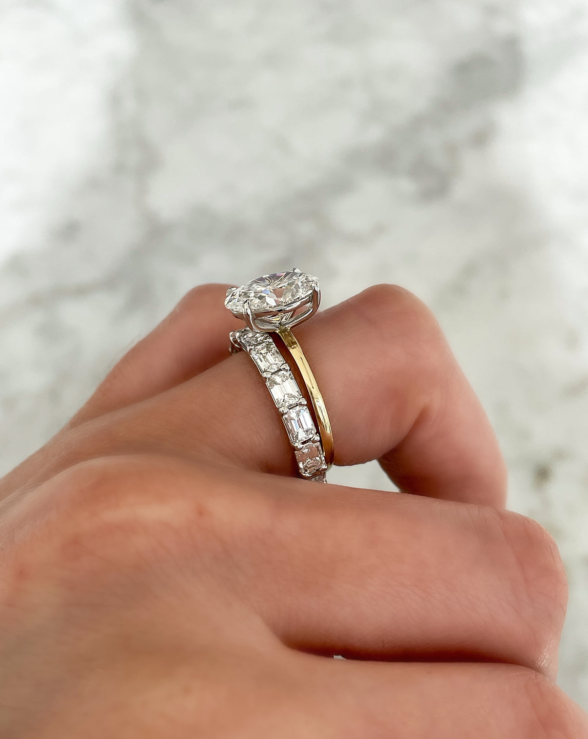 side view of sideways emerald band