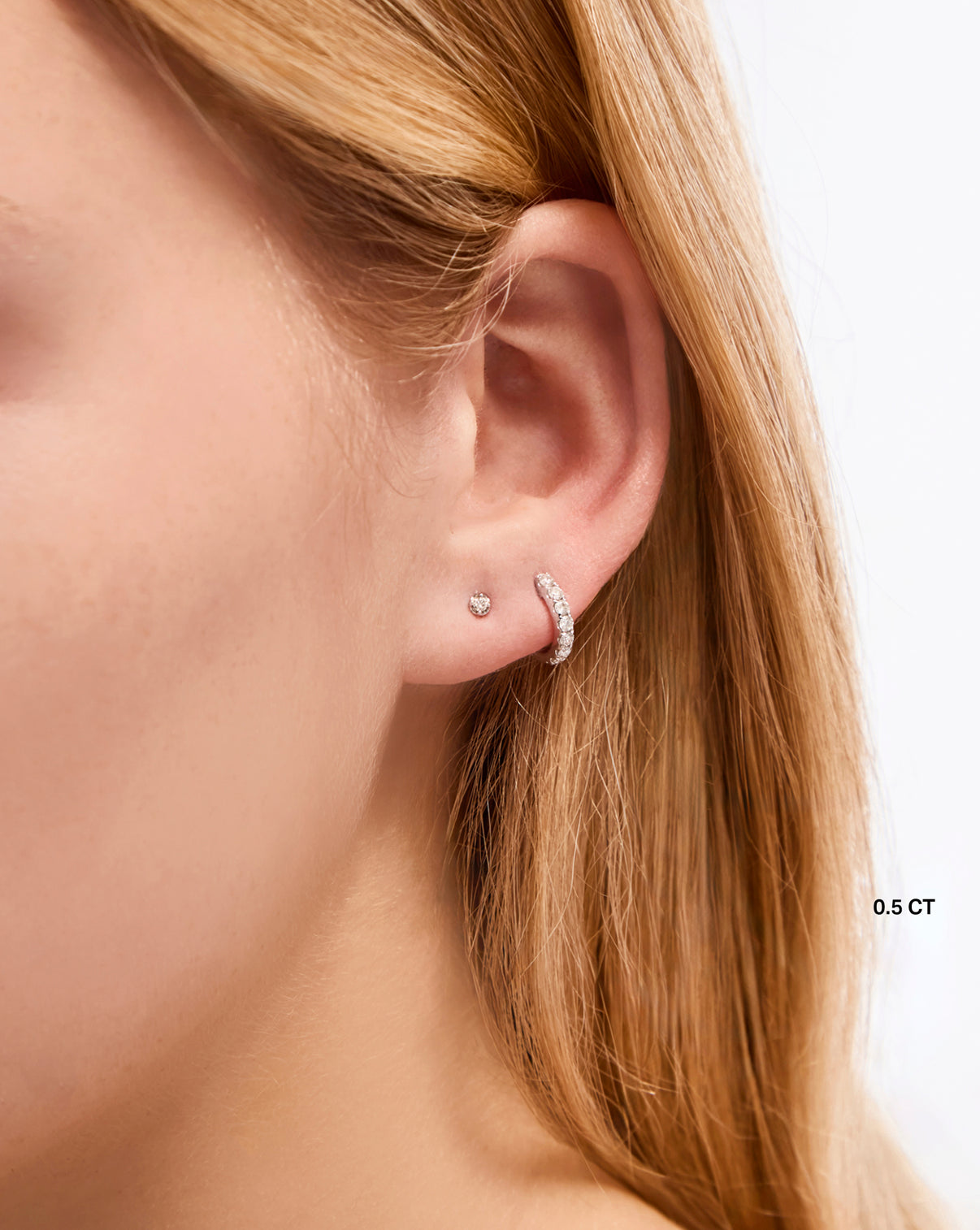 Tennis Trio Earrings 0.5 carat styled with just the stud on model