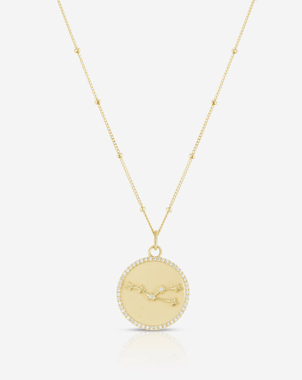 Zodiac Constellation Necklace in yellow gold taurus flat lay