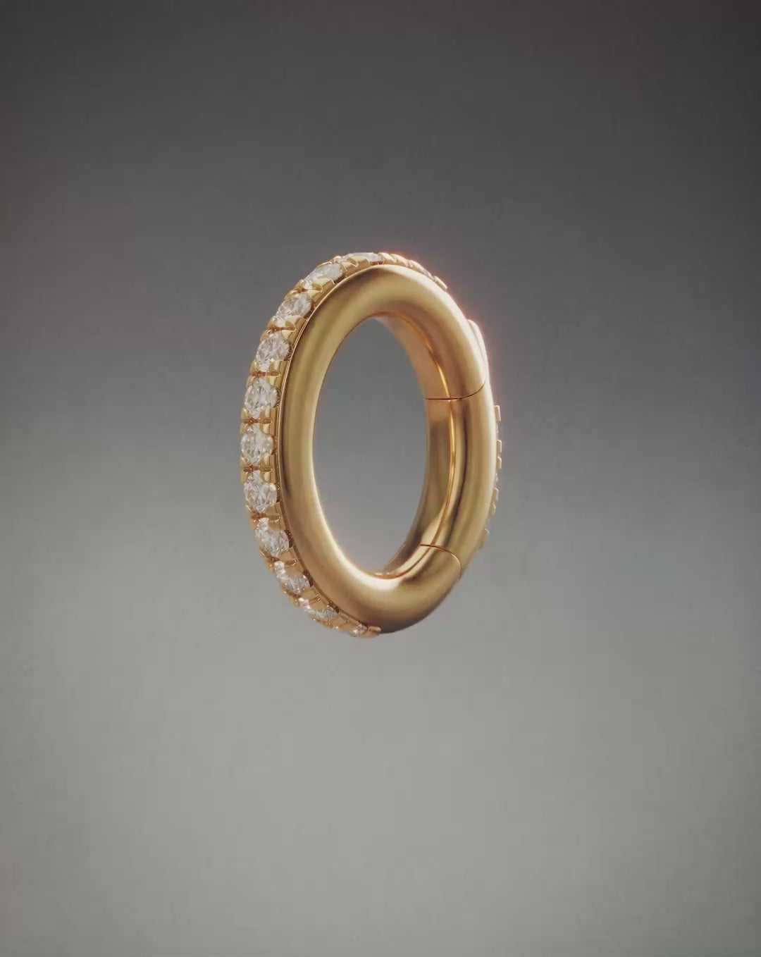 a woman speaking about the Clique Collection and how to use the ring clique clasp to stack and style multiple rings 14k yellow gold 14k white gold sterling silver