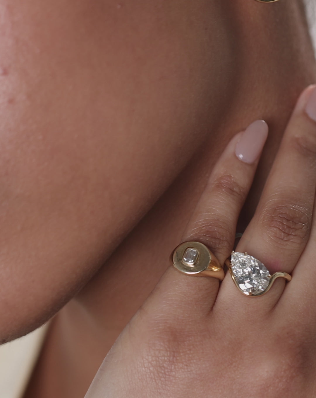 video of model wearing Ring Concierge 4.32 Pear Lab Diamond in Curve Whisper Thin® 14K Yellow Gold Engagement Ring 