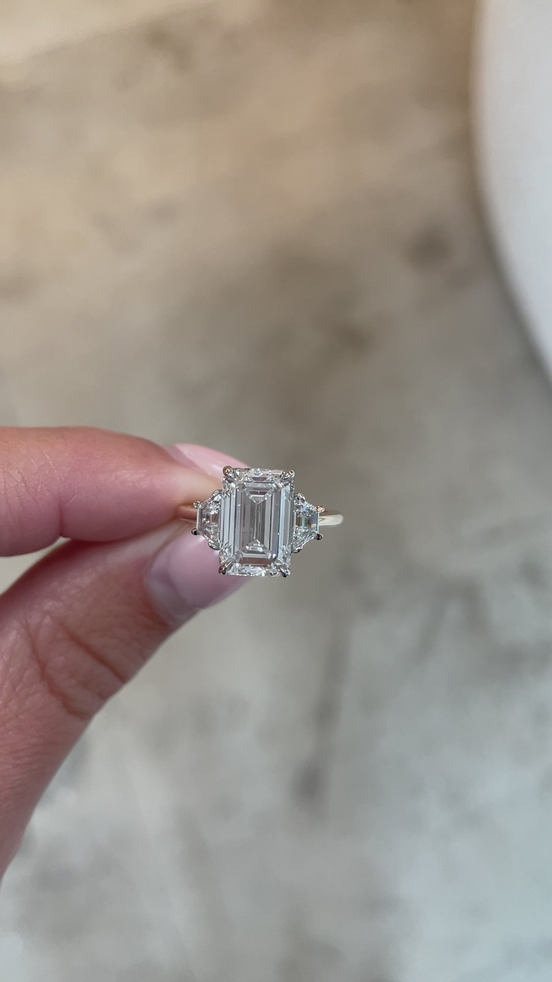 video of 3.5ct emerald in the whisper thin with trapezoids 