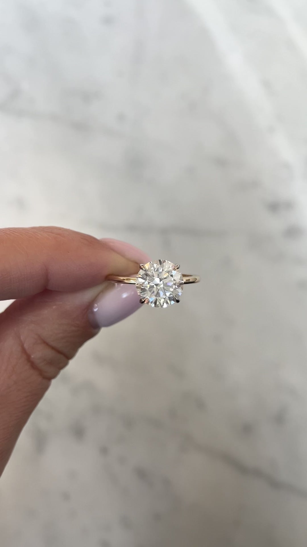 video of 2.5ct round in the whisper thin with hidden halo