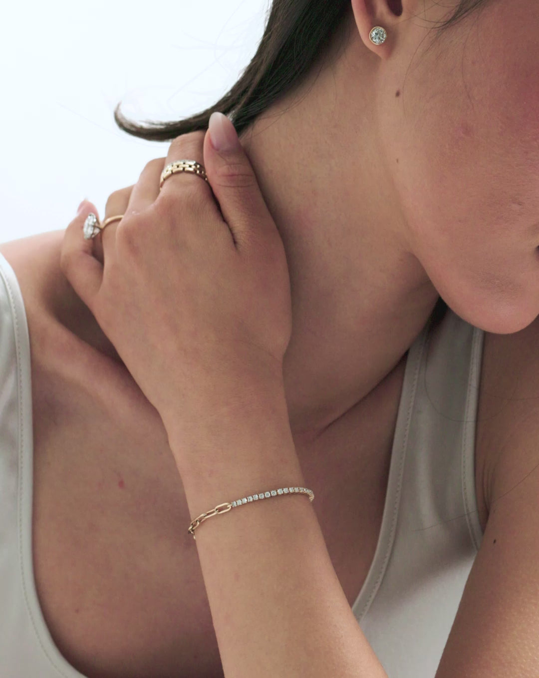 Video of model highlighting our Round Lab Diamond Tennis Chain Bracelet along with other tennis chain bracelets