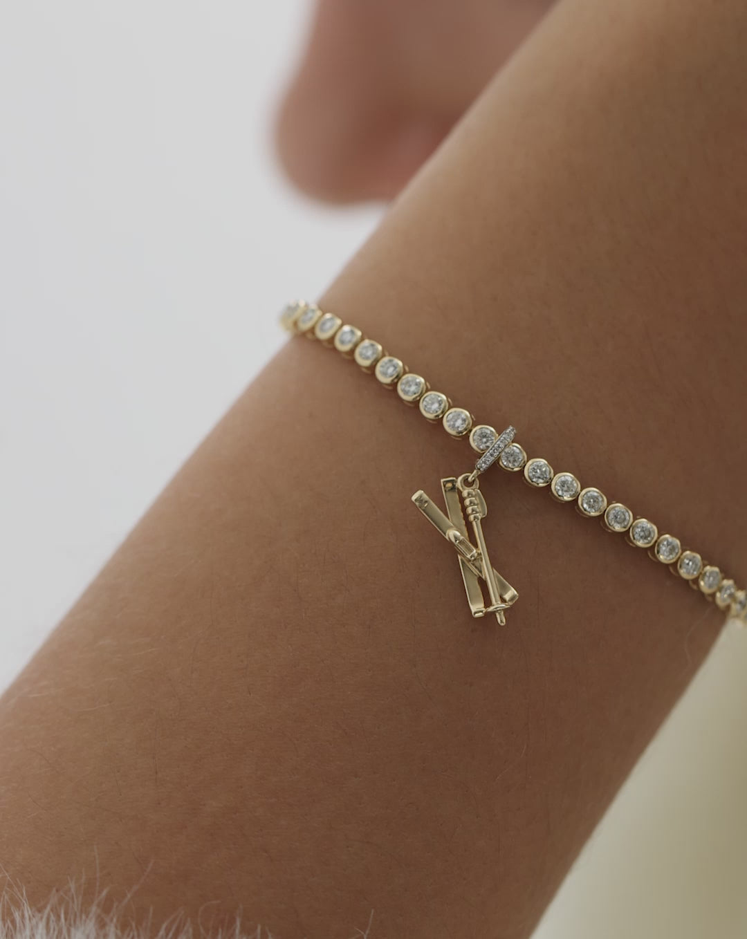 ski charm styled on-model with tennis bracelet video