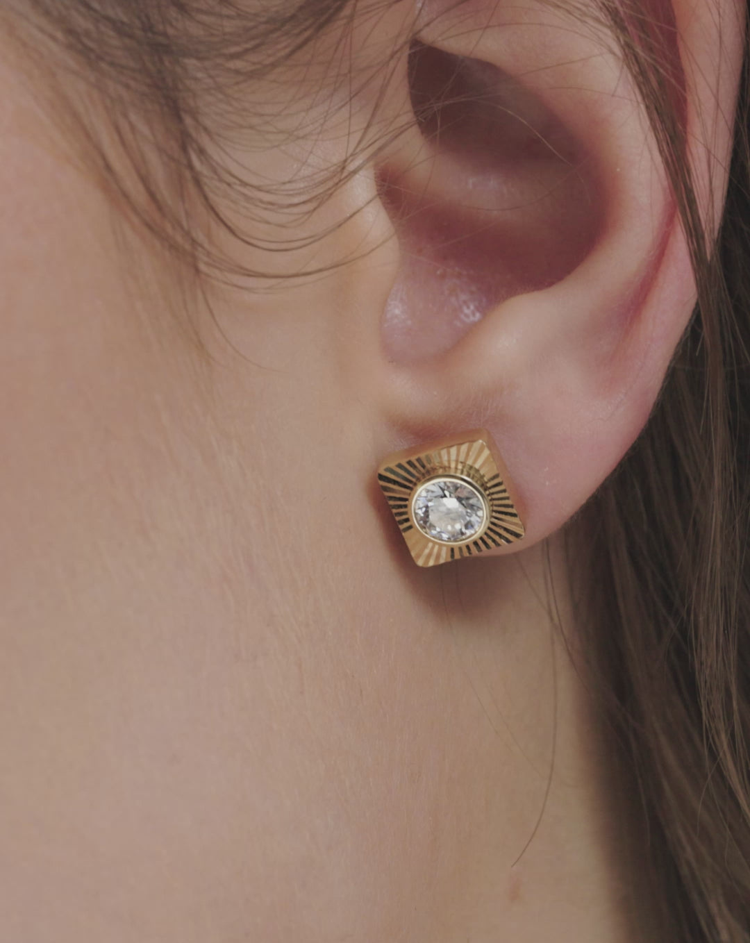 video of Aureum fluted studs on ear