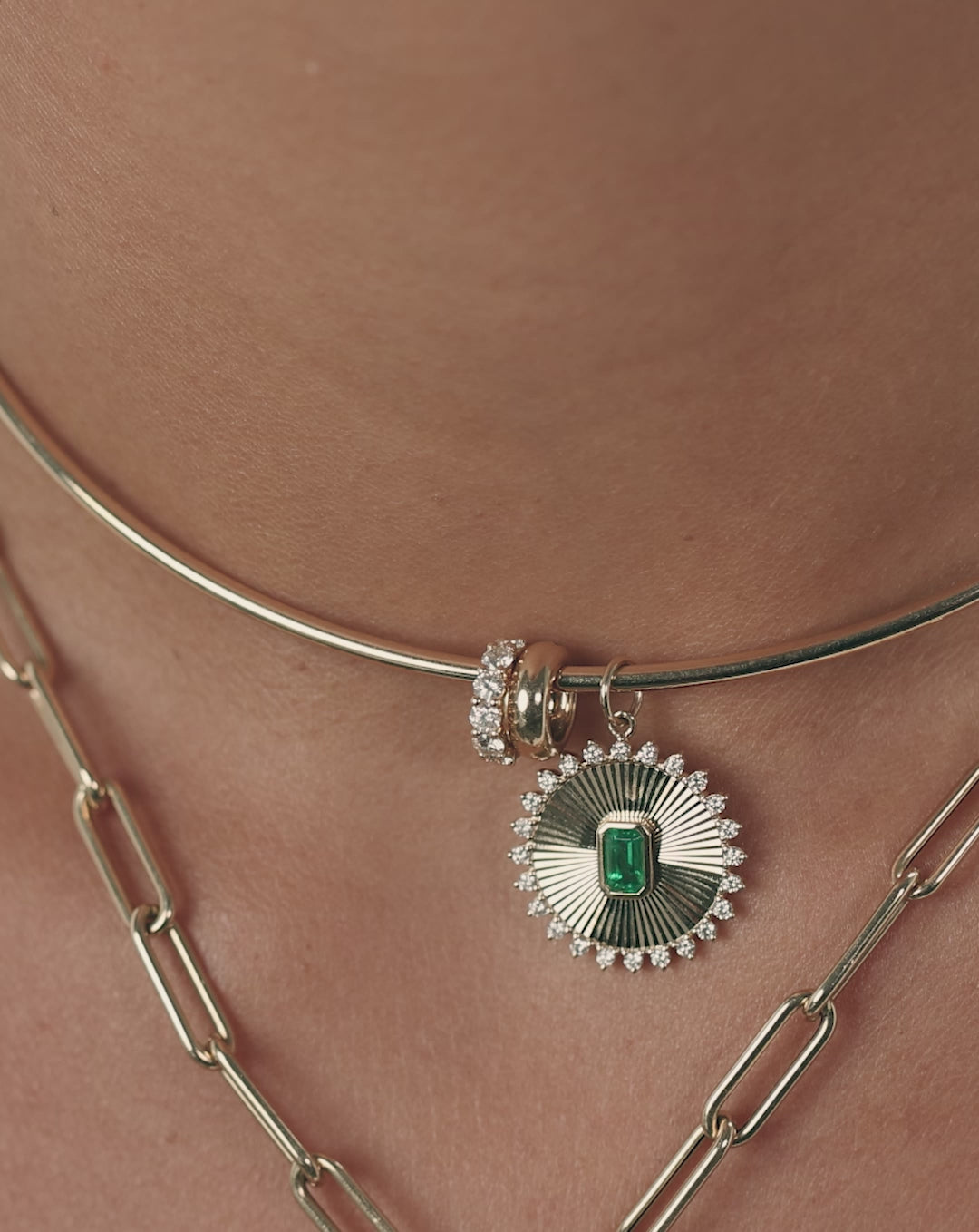 Emerald pendant necklace styled for sophisticated everyday wear
