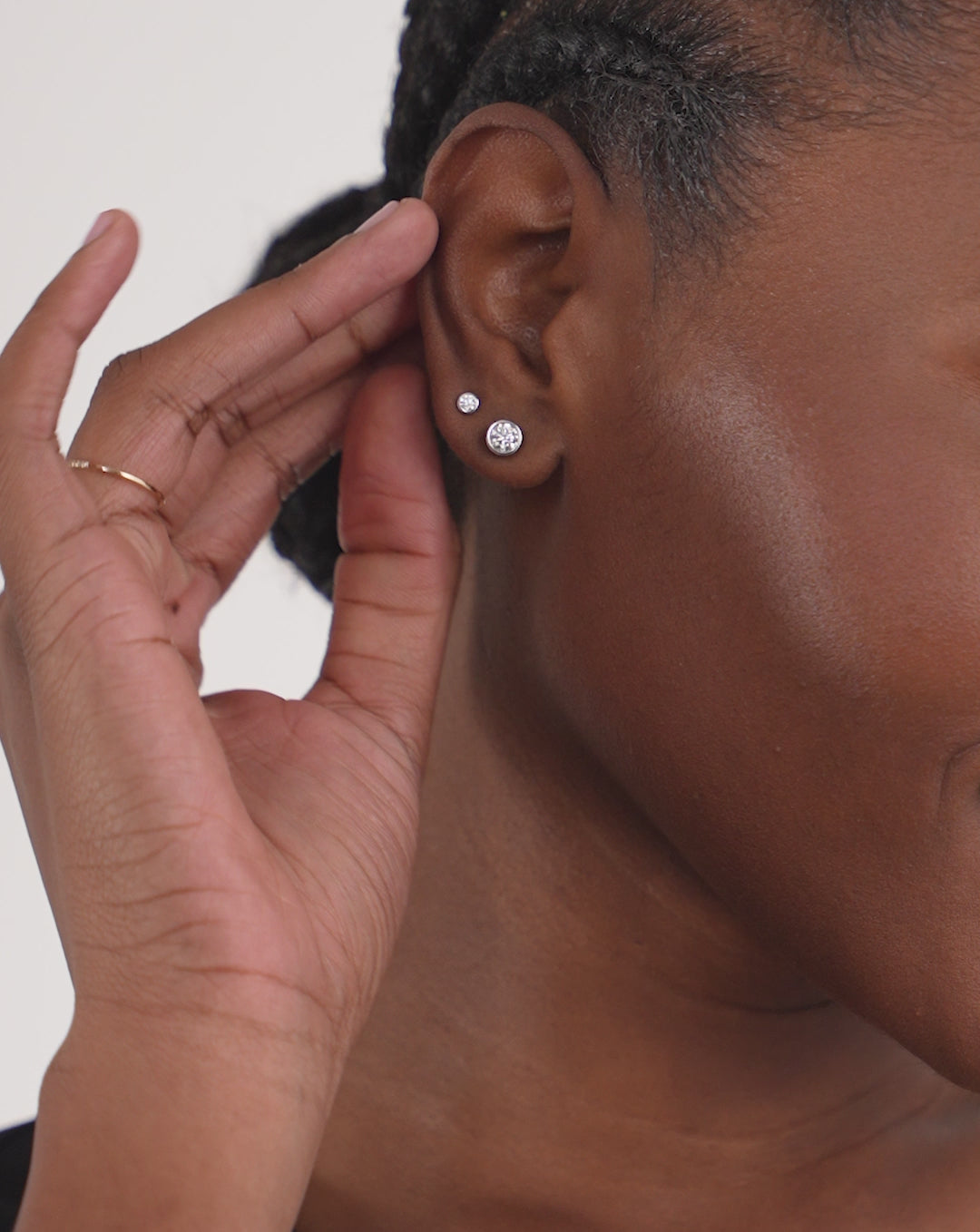 Video of Bezel-Set Classic Diamond Studs worn with the Bezel-Set Petite Diamond Studs in ear