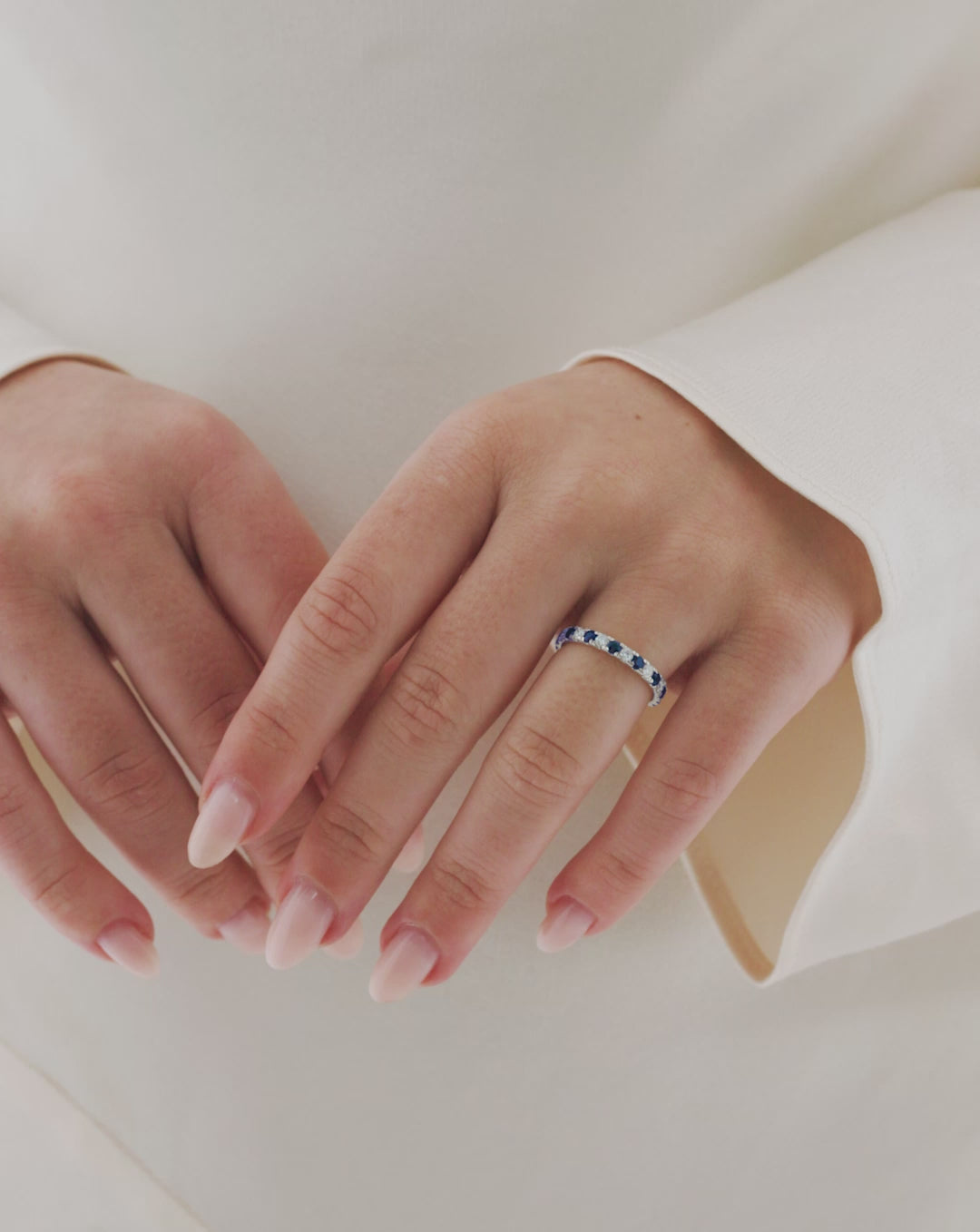 video of a model wearing the classic sapphire and diamond band