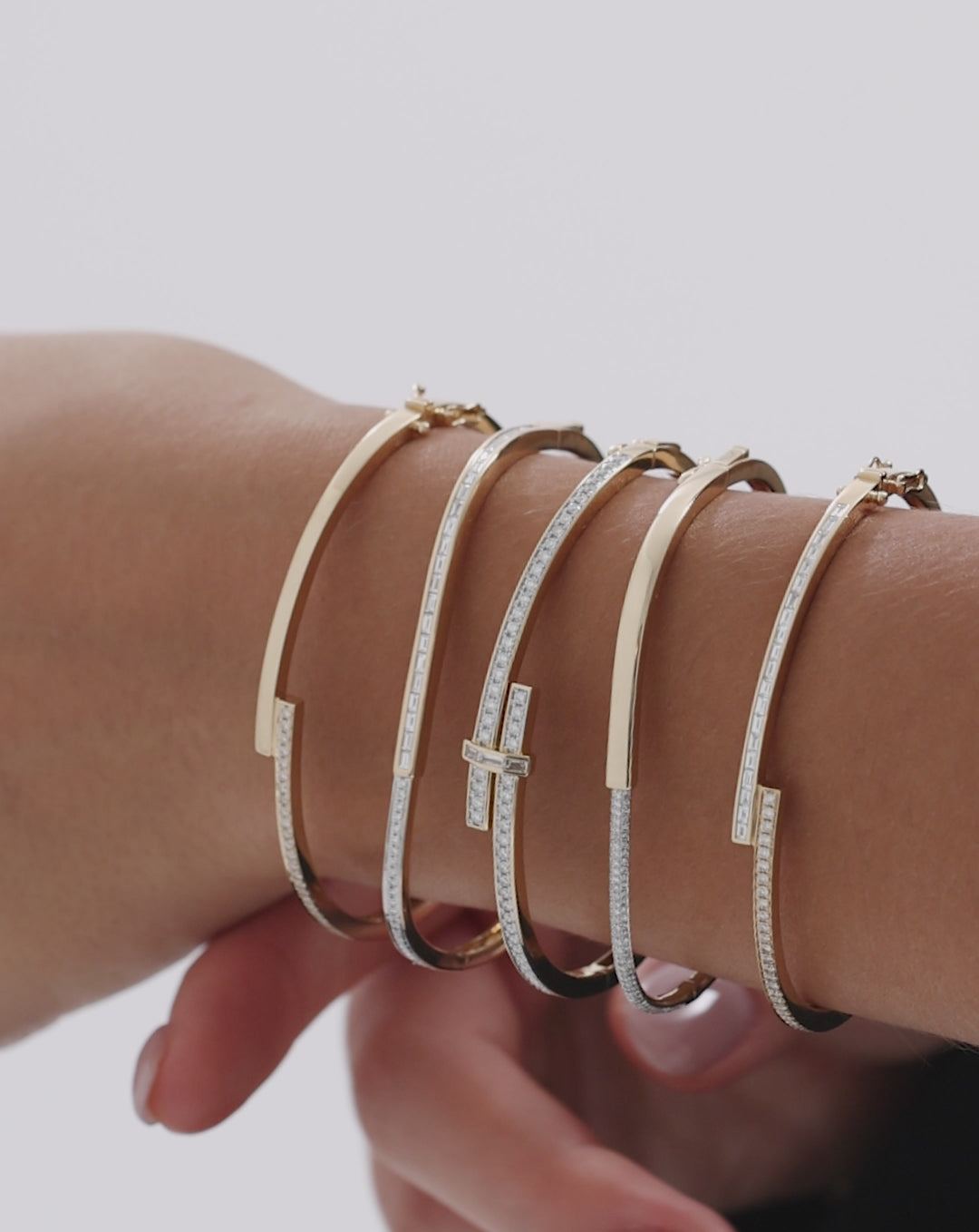 Round Half Diamond Wrap Bangle rotating 360 degrees to showcase the sparkling diamonds, gold finish, and elegant curved design from all angles