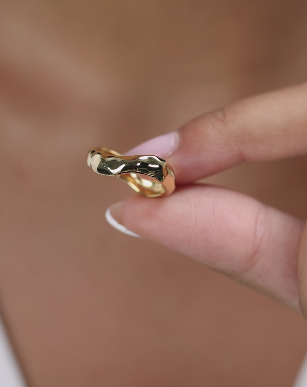 Video showcasing Ring Concierge Melted Stackable Ring Set from multiple angles, demonstrating the rings' organic forms and how they stack together