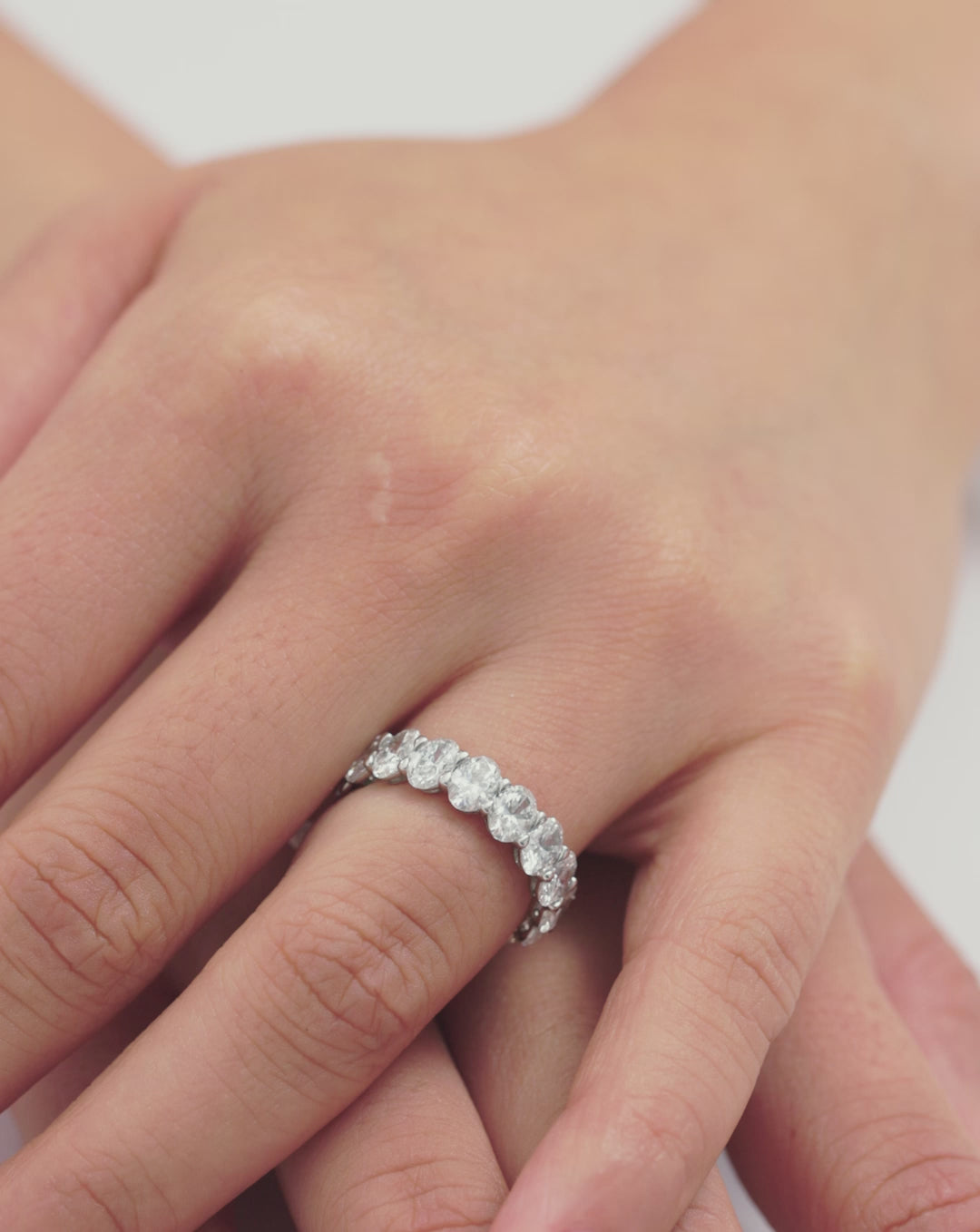video of oval eternity Diamond Band shown on model global