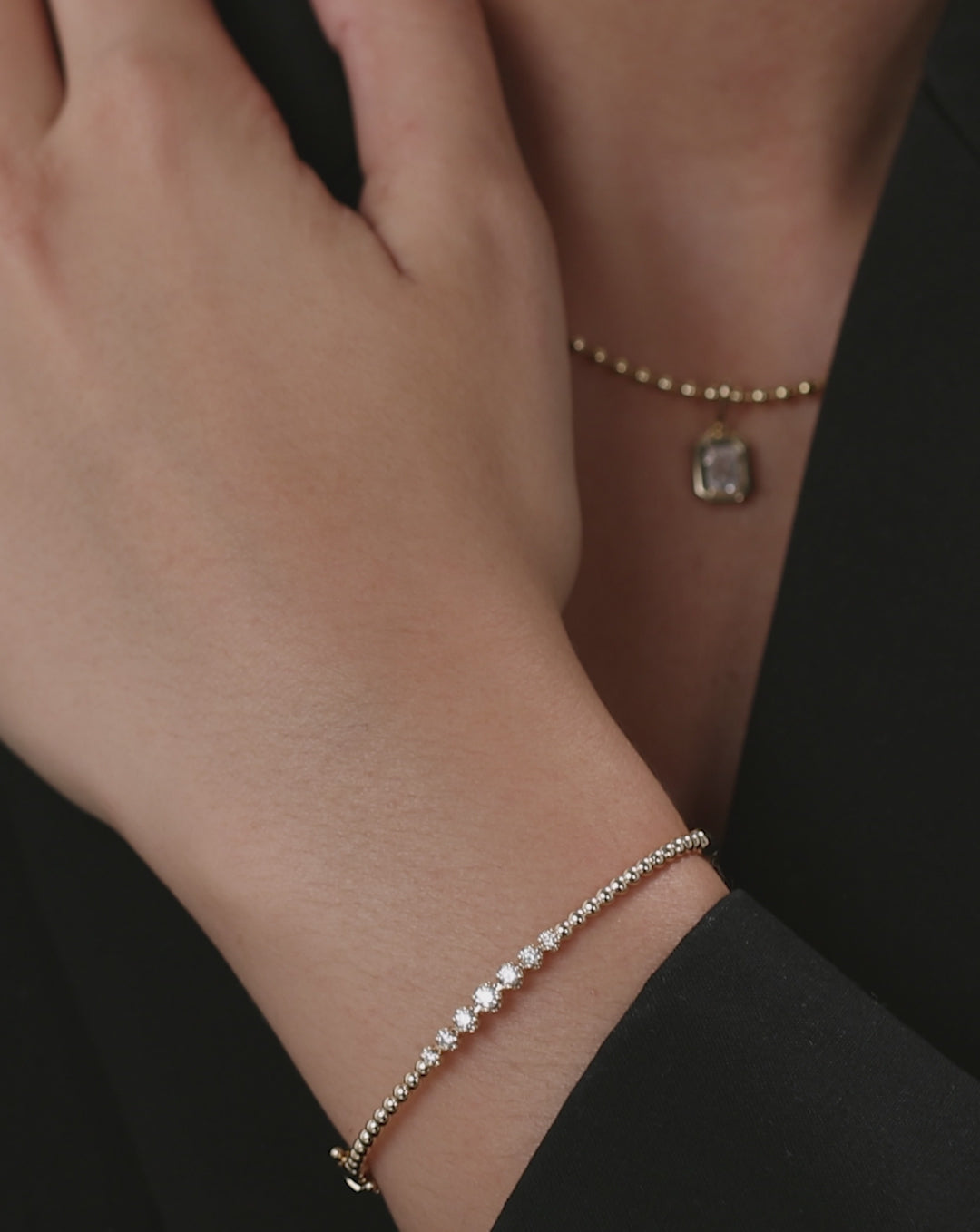 Ball Diamond Cluster Bangle product demonstration video showing the 14k gold bracelet with diamond details