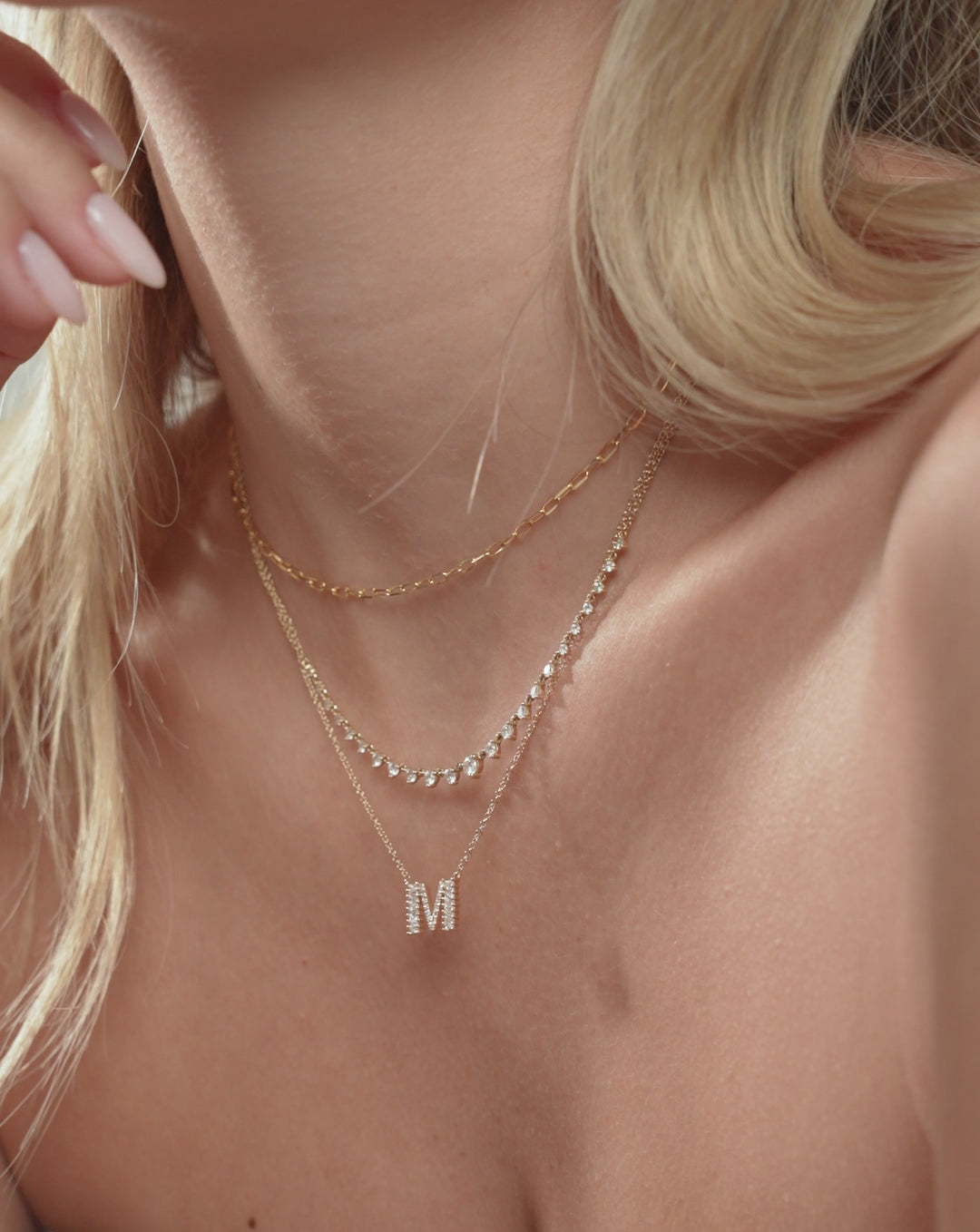 Video of Baguette + Pavé Initial Necklace on model
