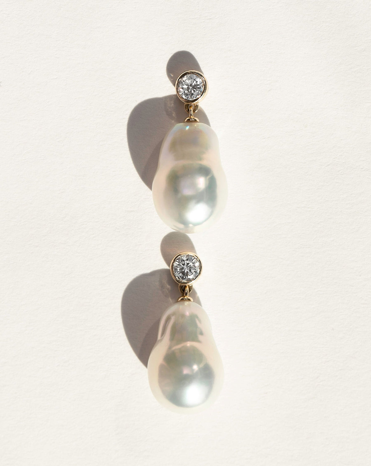 Ring Concierge Earrings 14k Yellow Gold Organic Pearl Earrings - on model