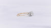 Tribeca VOW by Ring Concierge round with trio side stones engagement ring in yellow gold.