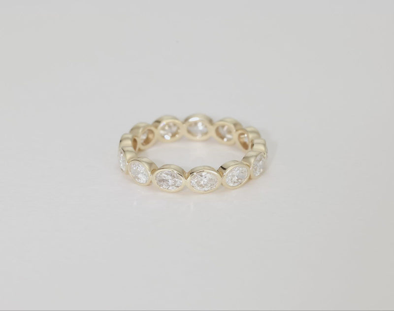 Bridal Wedding Bands Sideways Petite Oval Bezel Eternity Band rotating video