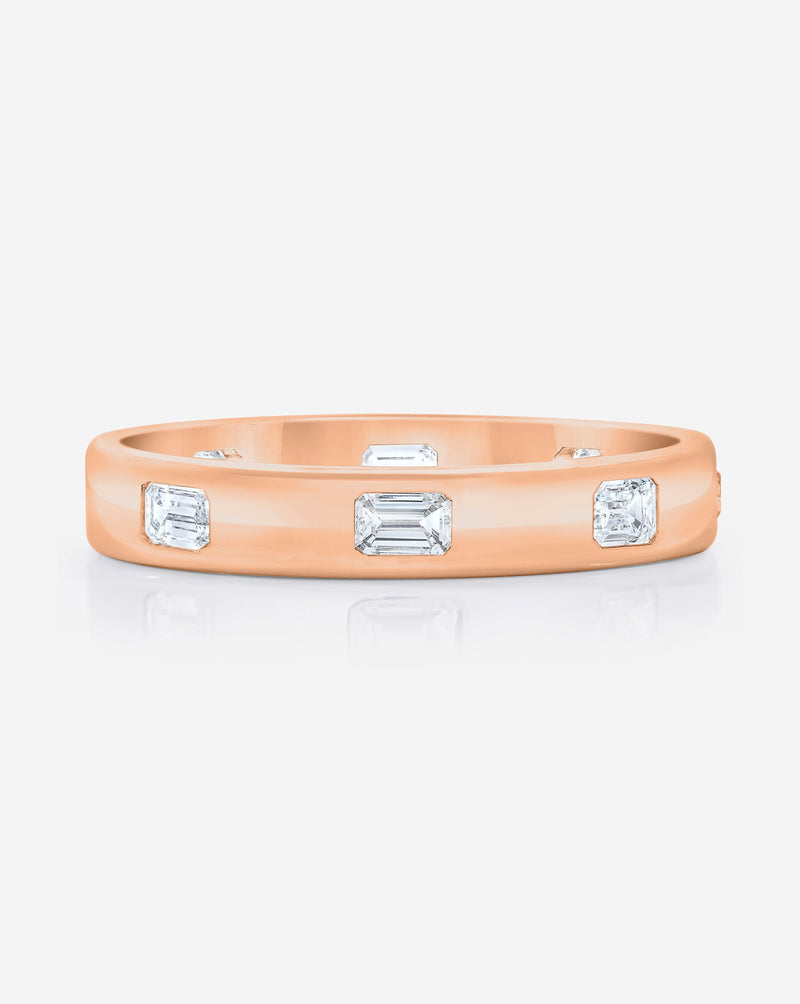 Bridal Wedding Bands 14k Rose Gold / 3 Emerald Inlay Eternity Band flat lay image