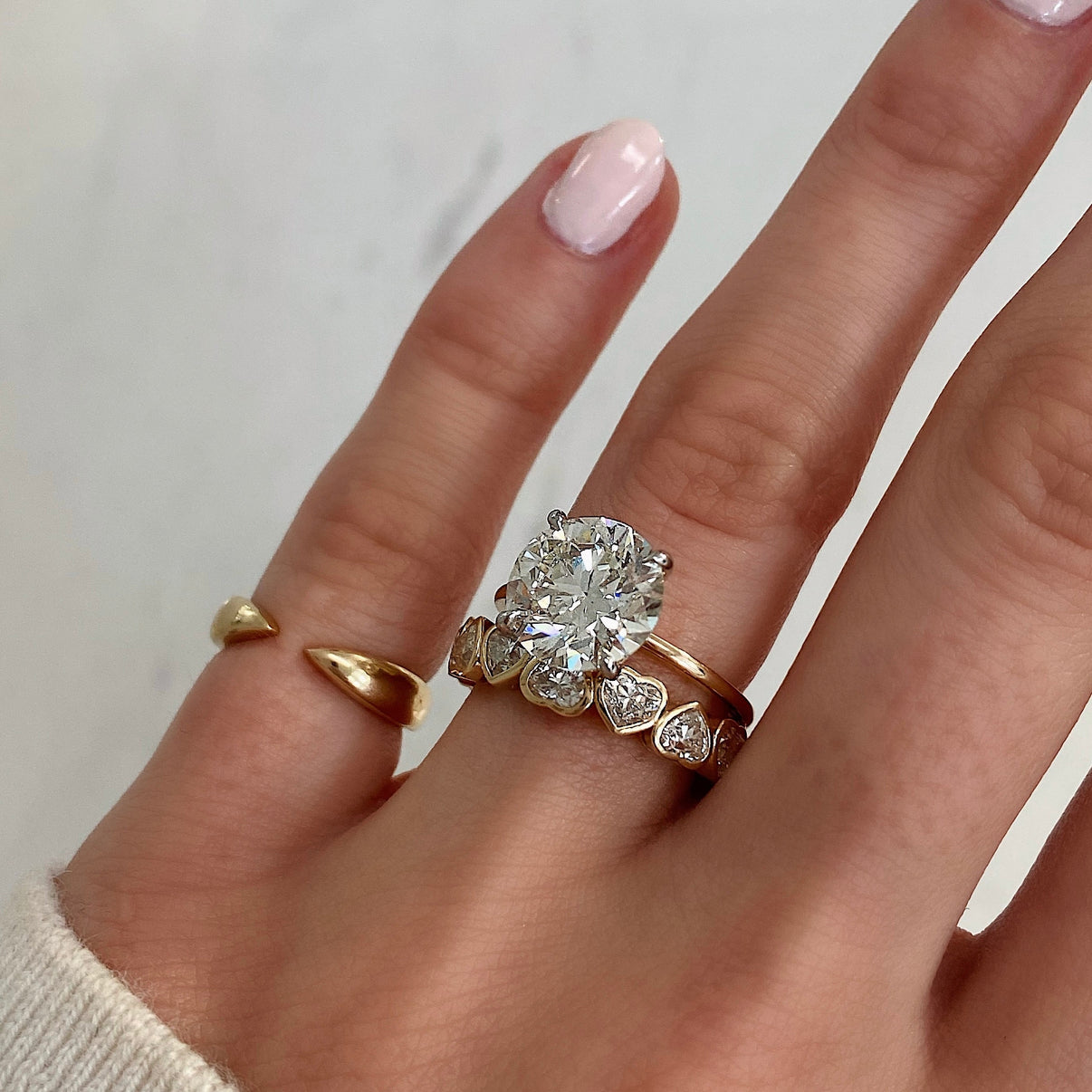 Bridal Wedding Bands Heart Bezel Eternity Band - paired with round engagement ring on model