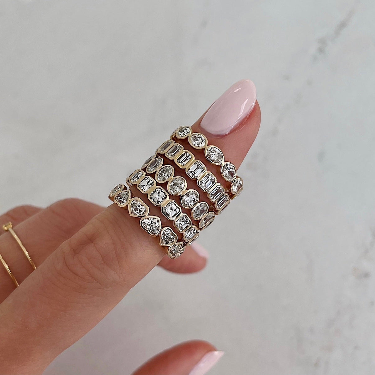 Bridal Wedding Bands Heart Bezel Eternity Band - on model shown all bezel-set shapes as comparison