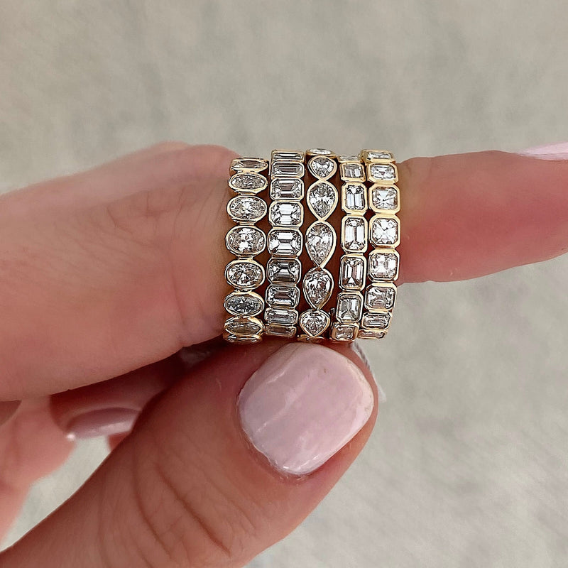 Bridal Wedding Bands Mini Pear Bezel Eternity Band - showing comparison between all bezel-set shapes on pointer finger