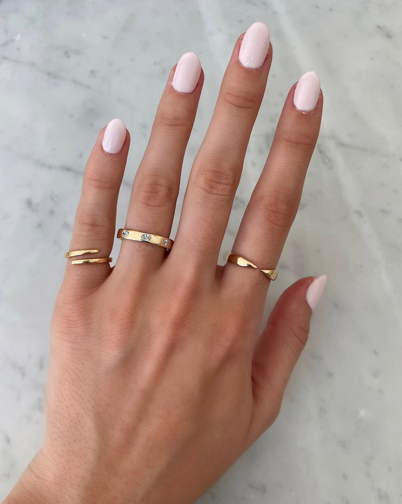 Bridal Wedding Bands Oval Luxe Inlay Eternity Band on model with 2 fine jewelry rings