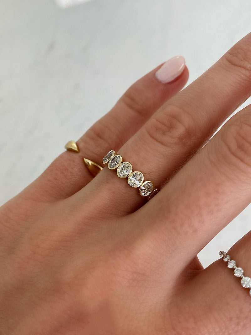 Bridal Wedding Bands Petite Oval Bezel Eternity Band on model
