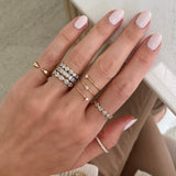 Bridal Wedding Bands Sideways Petite Oval Bezel Eternity Band 4 shapes stacked on pointer finger other fine jewelry rings
