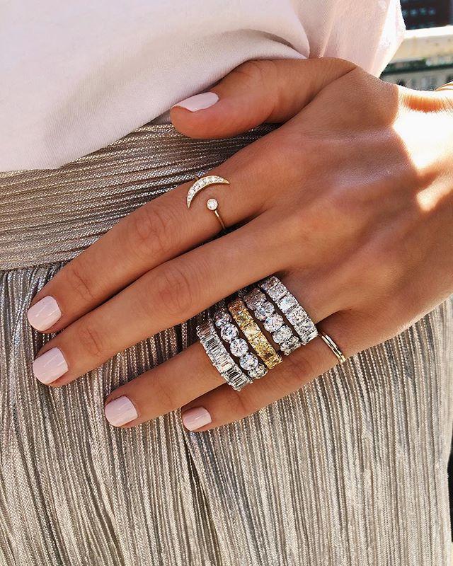 Bridal Wedding Bands Yellow Diamond Eternity Band on model  with multiple bold diamond eternity bands stacked