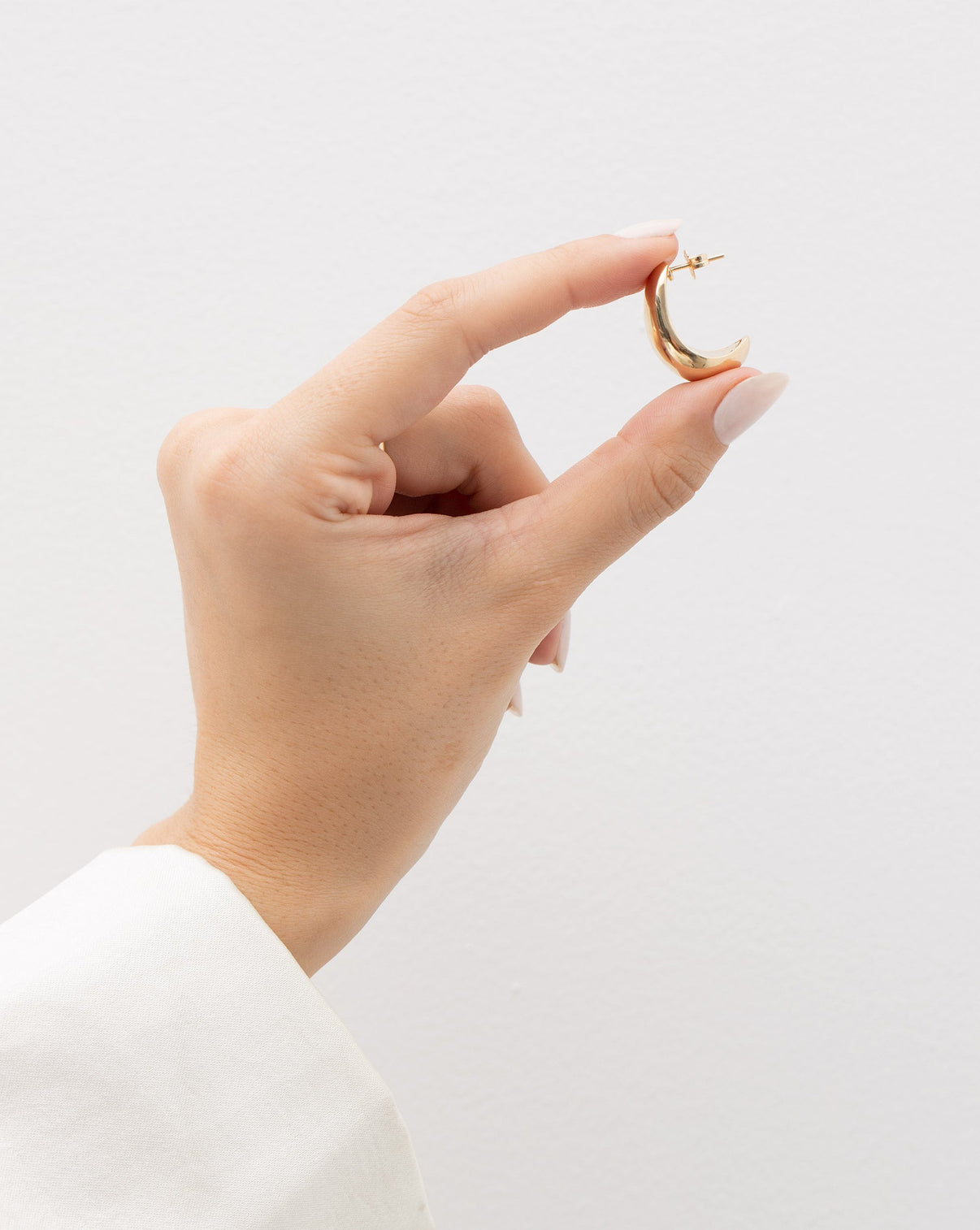 Ring Concierge Earrings Bold Cloud Statement Earrings - hand holding the hoop for scale