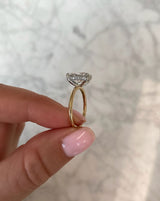 Ring Concierge Lab Grown Engagement Rings Oval Lab Diamond Ring hand holding ring from side