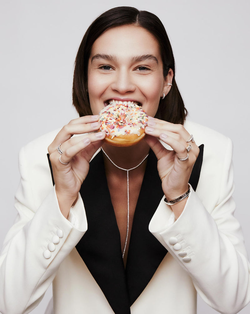 Ring Concierge Necklaces Diamond Lariat Necklace - 14K WG, styled with white & black blazer, model eating doughnut