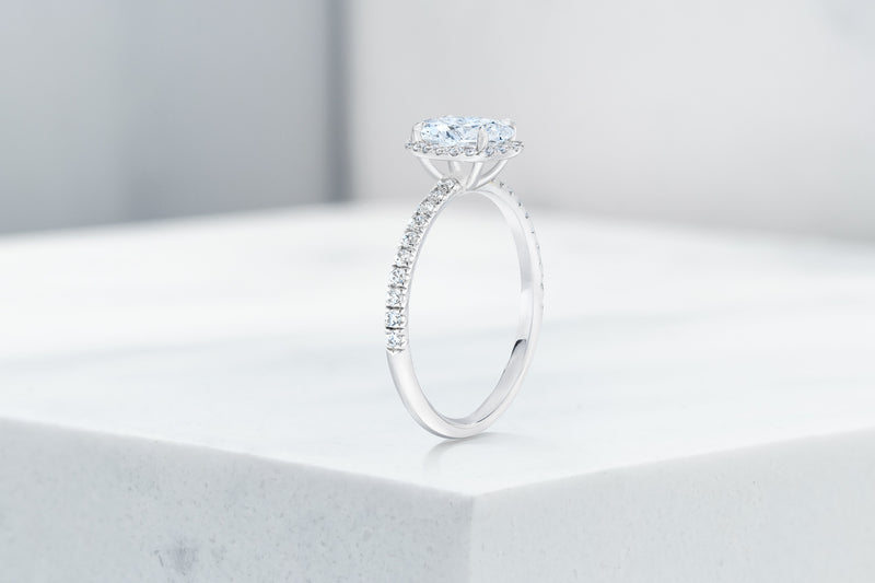 Delancey VOW by Ring Concierge oval halo micropave engagement ring in platinum. 33281357348952