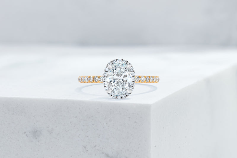 Delancey VOW by Ring Concierge oval halo micropave engagement ring in yellow gold. 33281357283416